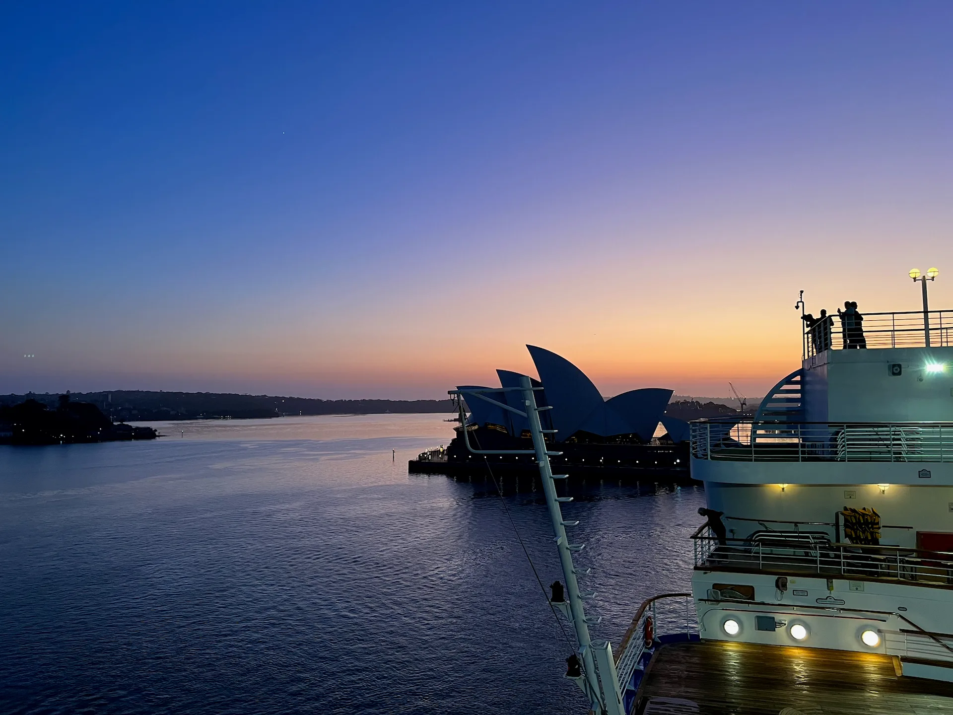 Sydney Opera House at sunset seen from a cruise ship deck