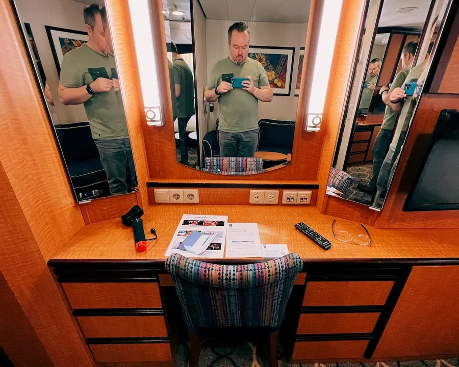 The desk area of an ocean view room on Royal Caribbean